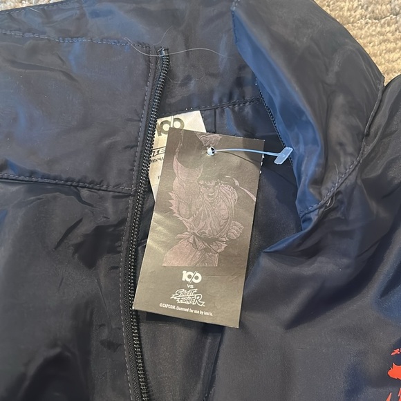 STREET FIGHTER - 'AKUMA HEAVEN' WINDBREAKER - BLACK XL - Picture 4 of 5